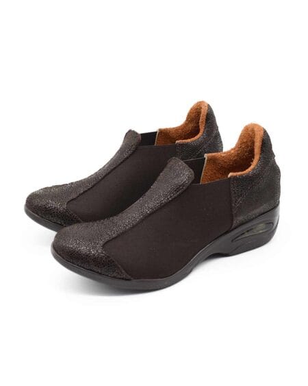 Urbano cuero dinobutelli.jpg8